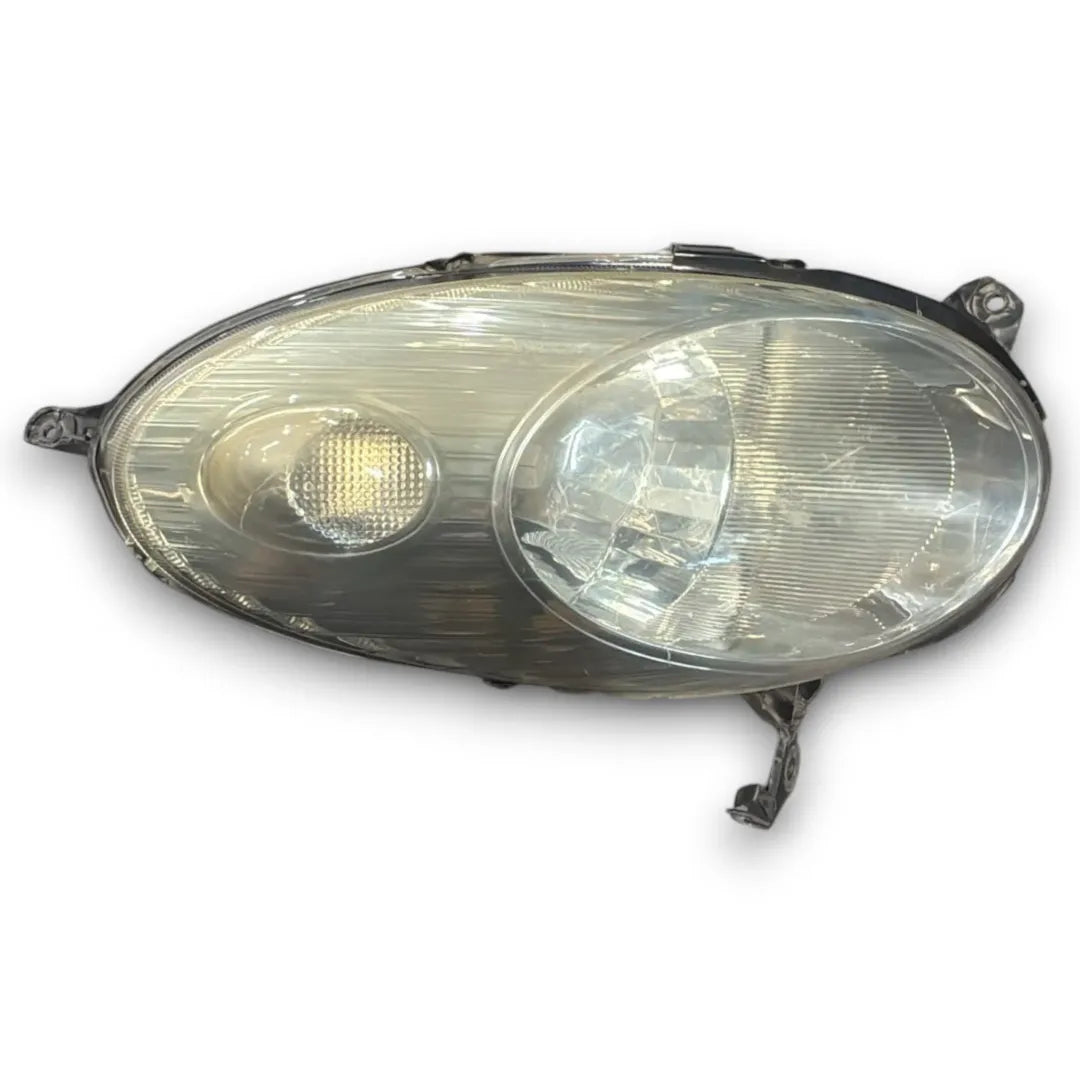 Faro anteriore destro Nissan Micra K12E 2002–2006 OEM 26010AX700