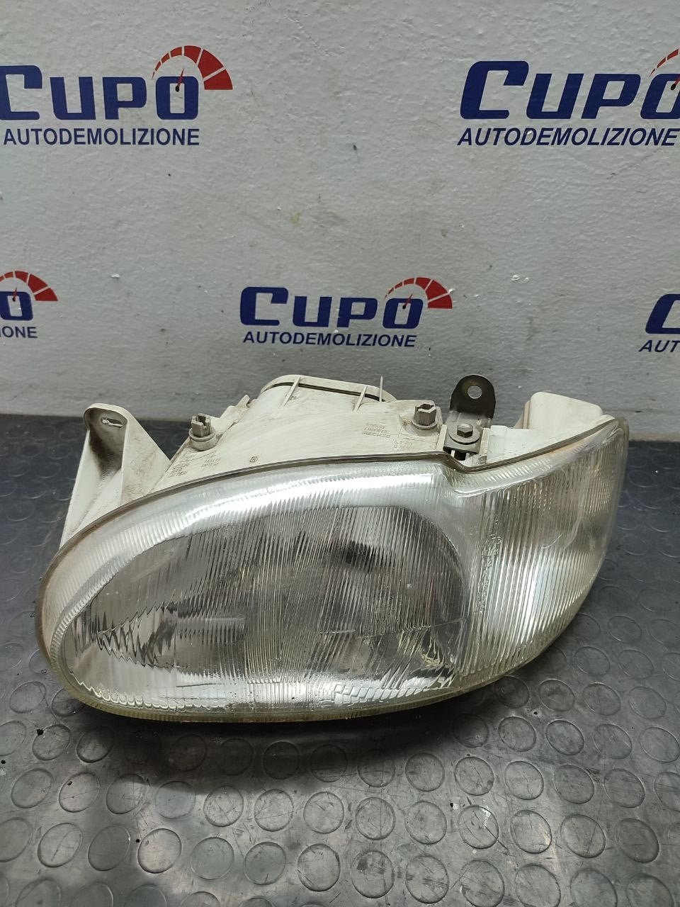 Faro / Fanale anteriore Destro Ford Escort (1995) Cod:13K060BA - F&P CRASH SRLS - Ricambi Usati